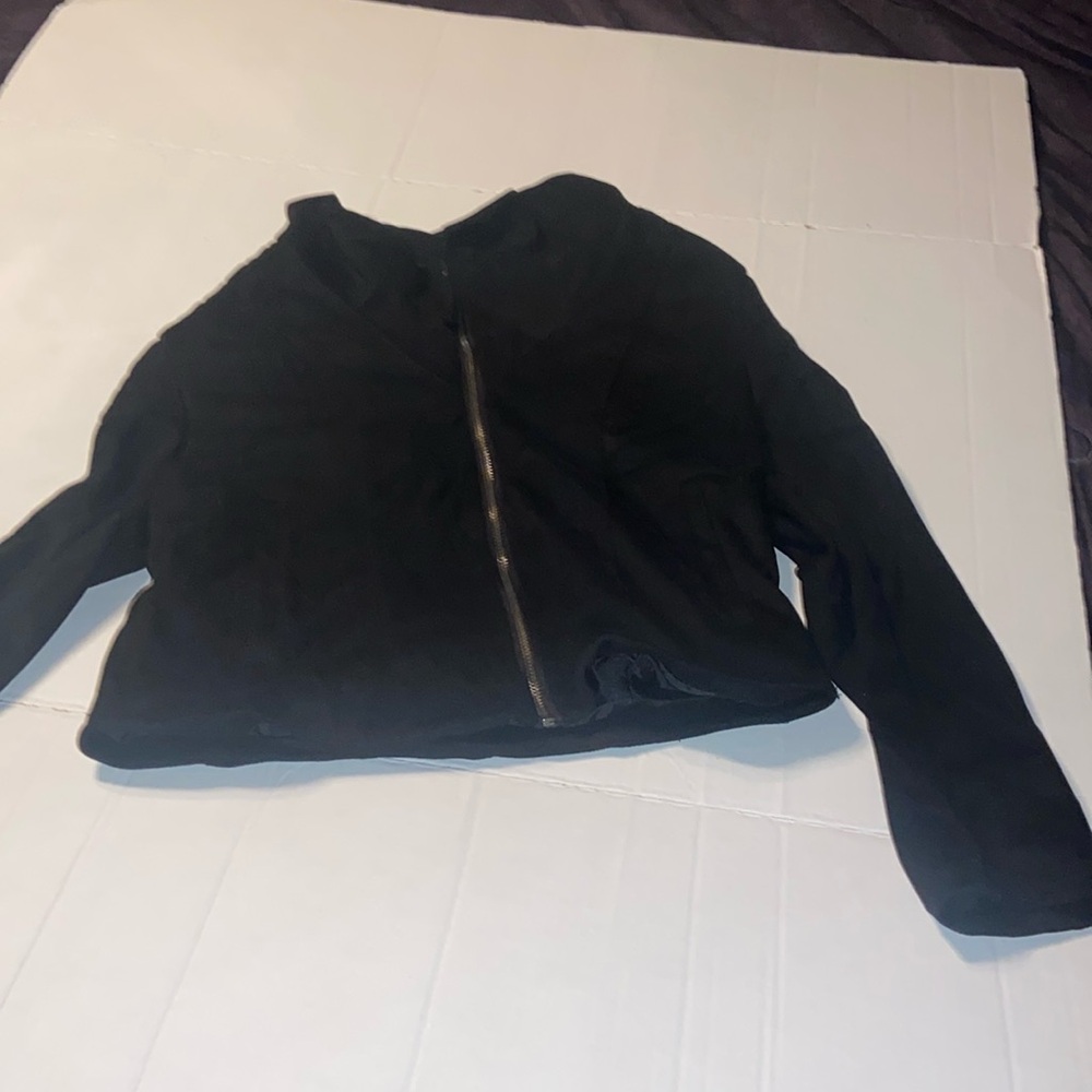 Black BKE jacket with shoulder pads size M